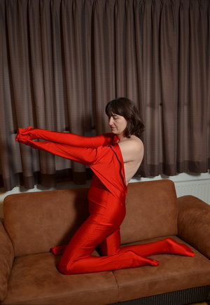 18 year old girl Agnes uncovers her perky tits as she gets completely naked